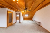 Zimmer Dachgeschoß - Familienparadies in begehrter Lage: Großzügiges Einfamilienhaus mit Garten und viel Freiraum